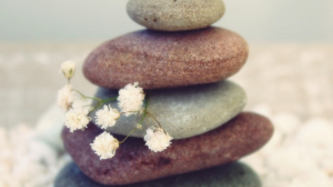 Five stones of various sized on top of each other to represent calm